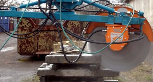 Echidna high speed concrete cutting rocksaw on tilting, rotating rail system